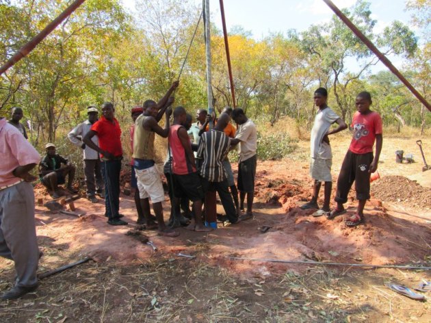 The men of the village came to help ADRA finish setting up the borehole. Watching them do this on Thursday made me excited for OUR drilling on Friday :-)